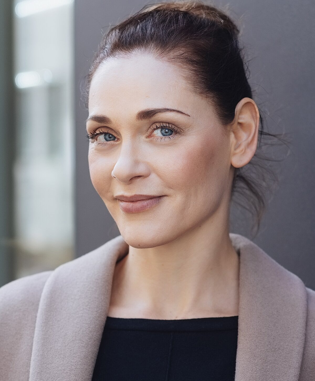 Orange County Brow lift model with blue eyes and brown hair.
