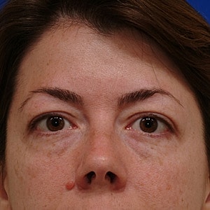 Close-up portrait of a woman with makeup.