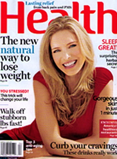 Woman smiling on Health magazine cover.